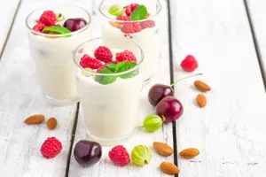 Delightful Mix Of Yogurt With Berries And Almonds Wallpaper