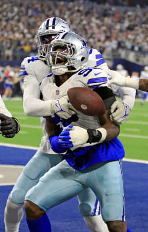 Demarcus Lawrence Wrestling For The Ball Wallpaper