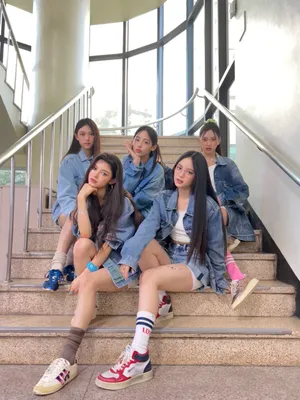 Denim Clad Group Staircase Pose Wallpaper