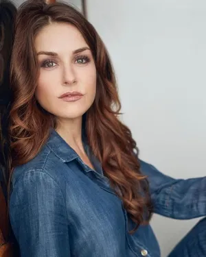 Denim Clad Woman Portrait Wallpaper