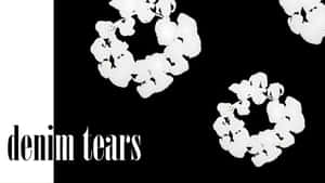 Denim Tears Brand Logo Wallpaper