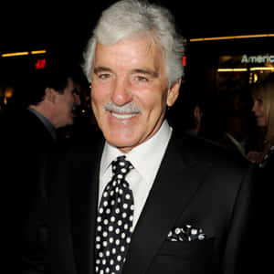 Dennis Farina Posing In A Tailored Suit Wallpaper