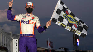 Denny Hamlin Holding Flag Wallpaper