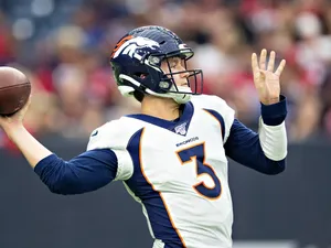 Denver Broncos Quarterback Action Shot Wallpaper