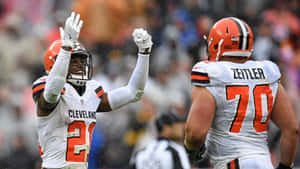 Denzel Ward Celebrating With Kevin Zeitler Wallpaper