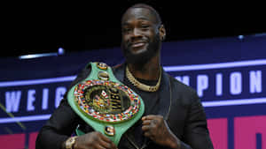 Deontay Wilder With W B C Championship Belt Wallpaper