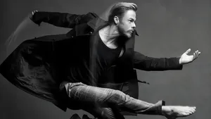 Derek Hough Dynamic Dance Pose Wallpaper