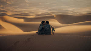 Desert Love Embrace Dune Backdrop Wallpaper