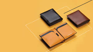 Designer Wallets Collection Yellow Background Wallpaper