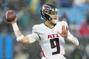 Desmond Ridder Atlanta Falcons Quarterback Action Wallpaper