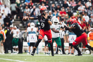 Desmond Ridder Cincinnati Quarterback Action Wallpaper