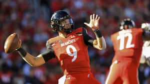 Desmond Ridder Quarterback Action Wallpaper