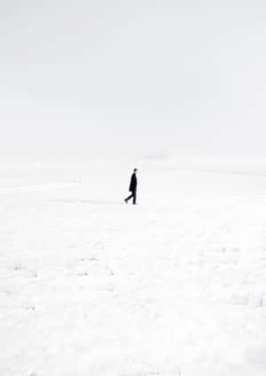 Desolate Snow Land Portrait Lonely Man Wallpaper