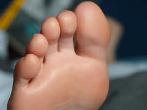 Detailed Close-up Of Human Toe Wallpaper