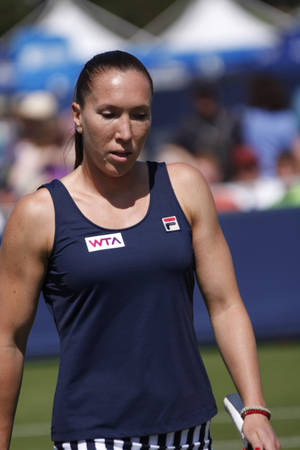 Determined Jelena Jankovic In Action Wallpaper