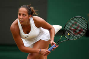 Determined Madison Keys In The Heat Of The Game Wallpaper