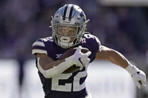 Deuce Vaughn Kansas State Football Action Wallpaper