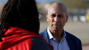 Deval Patrick Engaged In A Deep Conversation Wallpaper