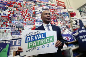 Deval Patrick Signing A Campaign Banner Wallpaper