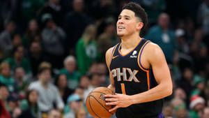 Devin Booker Holding Ball Photograph Wallpaper