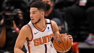 Devin Booker Side View Photograph Wallpaper