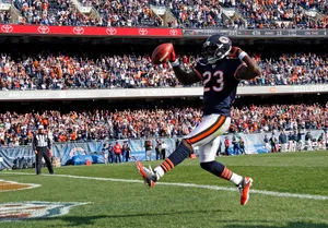 Devin Hester Celebrating Touchdownat Soldier Field Wallpaper