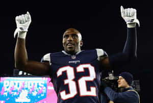 Devin Mccourty In Action On The Field Wallpaper