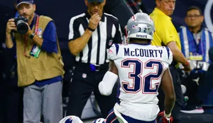 Devin Mccourty In Action On The Field Wallpaper