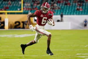 Devonta Smith In Action During Game Wallpaper