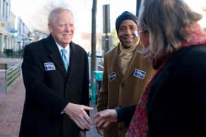 Dick Gephardt Shakes Hands With A Supporter Wallpaper