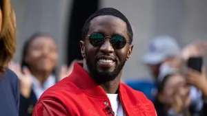 Diddy Smiling In Sunglasses Wallpaper