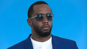 Diddy Stylish Blue Suit Wallpaper