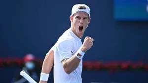 Diego Schwartzman Celebrates His Victory On The Tennis Court Wallpaper