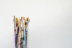 Different Types Of Paint Brushes Used By An Artist Wallpaper