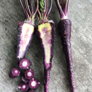 Dig Into Deliciousness With Purple Carrots Wallpaper