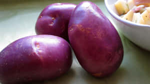 Dig Into Deliciousness With Purple Potatoes Wallpaper