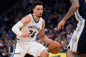 Dillon Brooks In Action During A Basketball Game Wallpaper