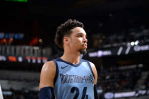 Dillon Brooks In Action On The Basketball Court Wallpaper