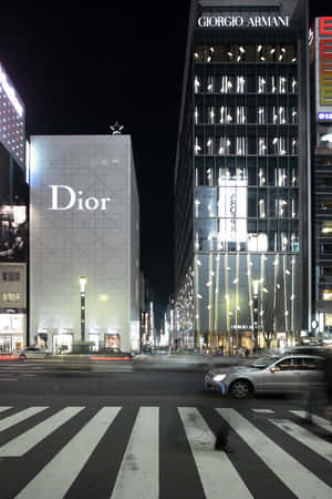 Diorand Armani Storefrontsat Night Wallpaper