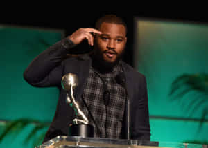 Director Ryan Coogler Posing At An Event. Wallpaper