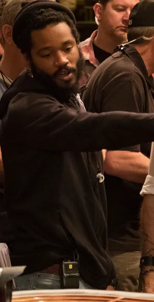 Director Ryan Coogler Posing For A Portrait Wallpaper