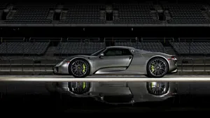 Discover The Art Of Speed: The Impressive Porsche 918 Spyder Wallpaper