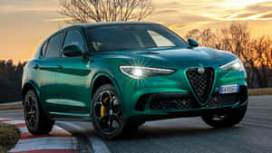 Discover The Breathtaking Alfa Romeo Stelvio In Action Wallpaper