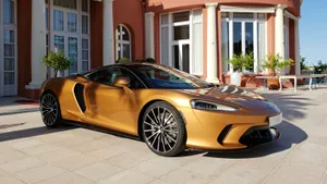 Discover The Elegance And Power Of The Mclaren Gt Wallpaper