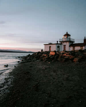 Discovery Park Lighthouse At Sunset.jpg Wallpaper