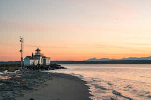 Discovery Park Lighthouseat Sunset Wallpaper