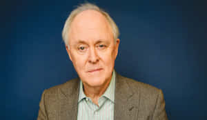 Distinguished Actor John Lithgow In A Portrait Shot Wallpaper