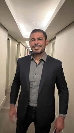 Distinguished Mma Fighter Antônio Rodrigo Nogueira In A Formal Suit Wallpaper