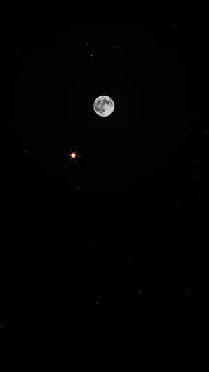 Dive Into A Star-studded Evening With Moon Iphone Wallpaper