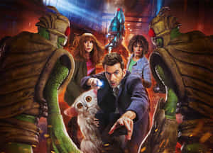 Doctor Who Adventure With Companionsand Aliens Wallpaper